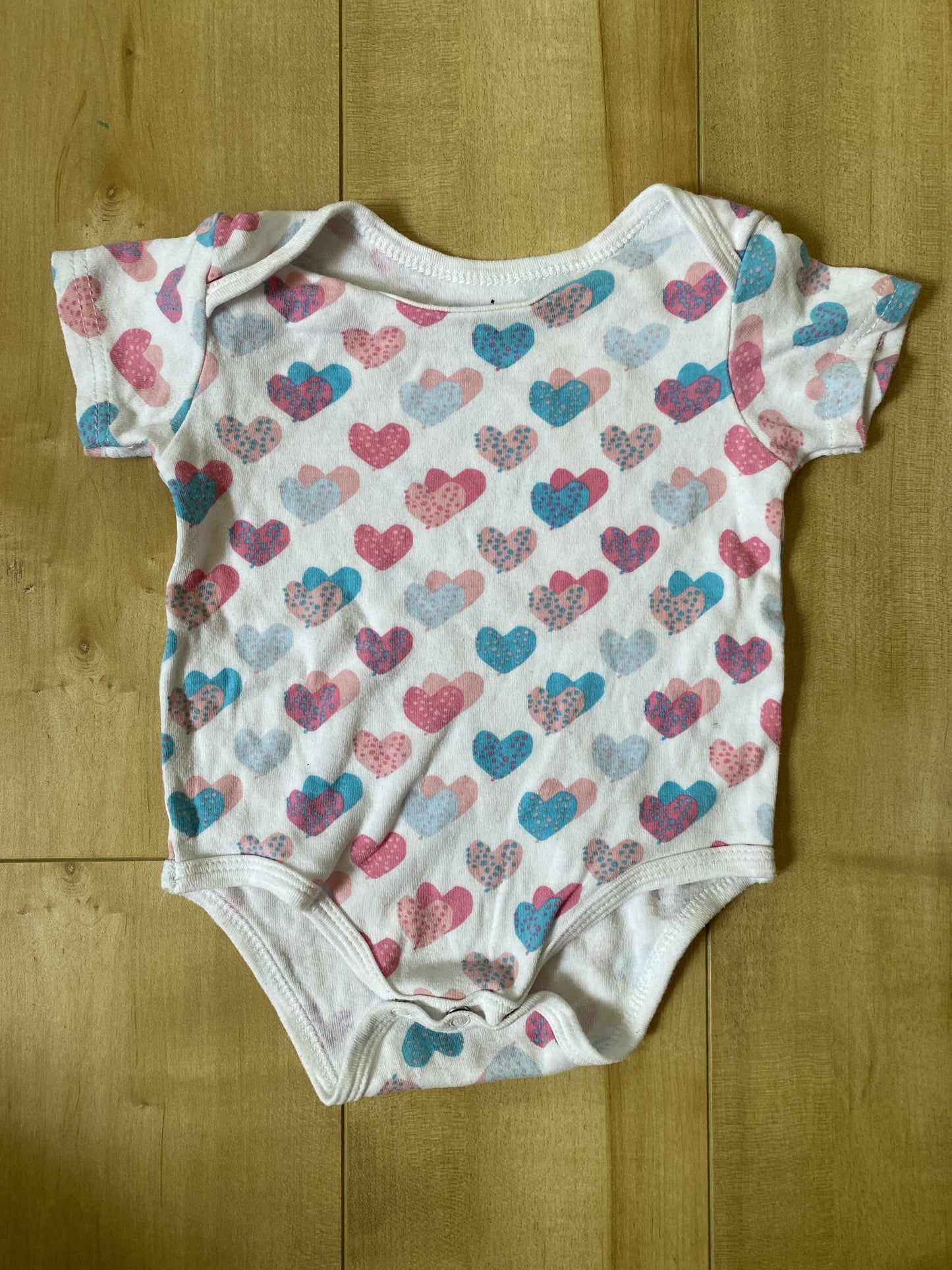 9-12 mois - Cache-couche